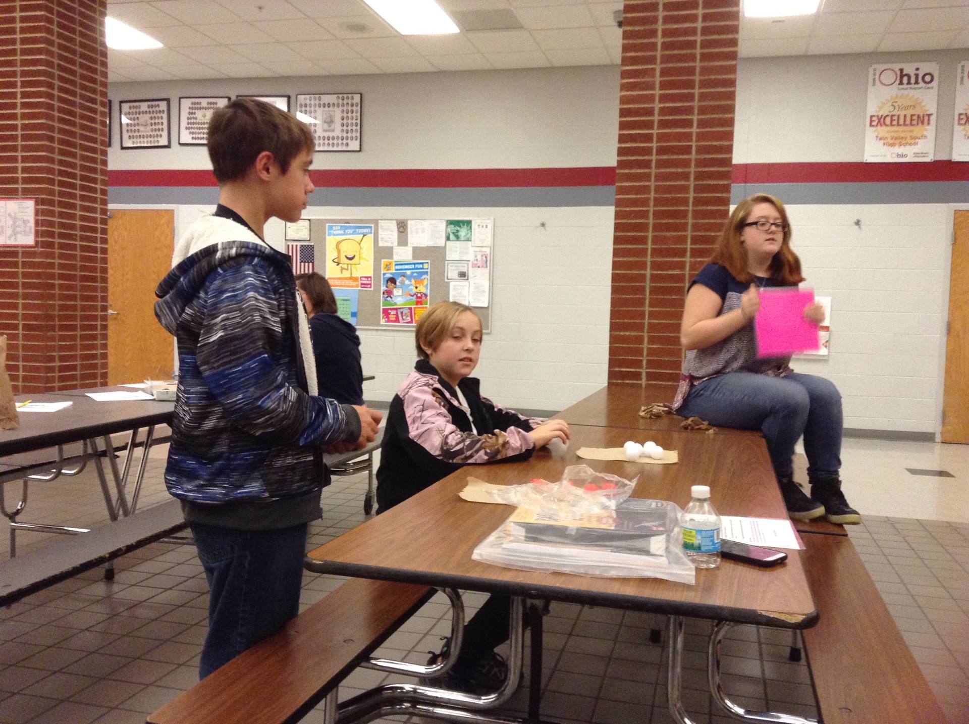 Mrs. Ackerman's students share energy activities with visiting families.
